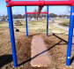 A Zeager Woodcarpet under a playground's climbing structure