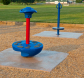 A Zeager Woodcarpet under a playground's spinning structure